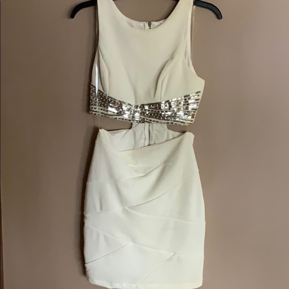 White dress with sequins. Gives two piece effect.
